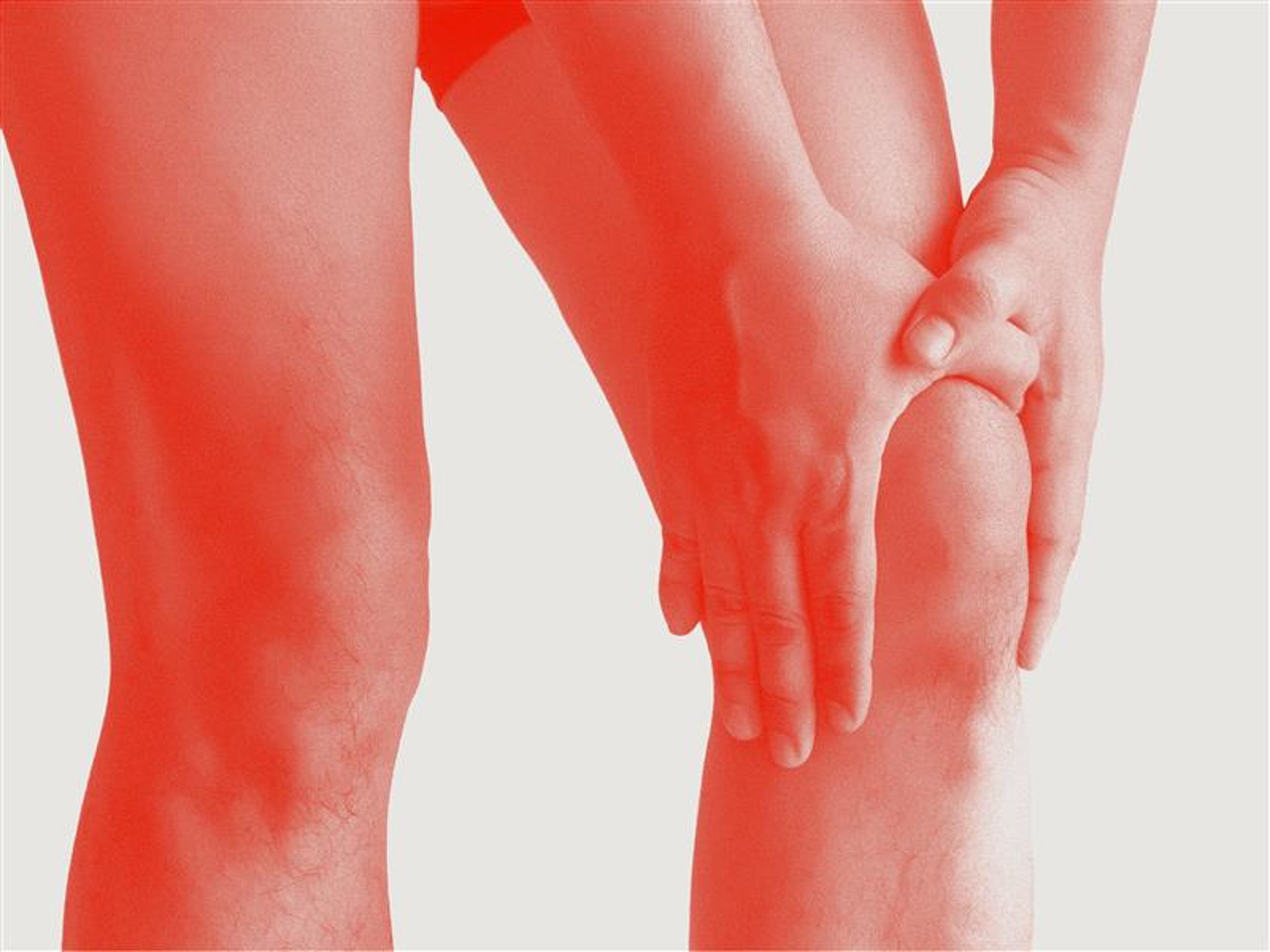 An illustration of a person holding their knee