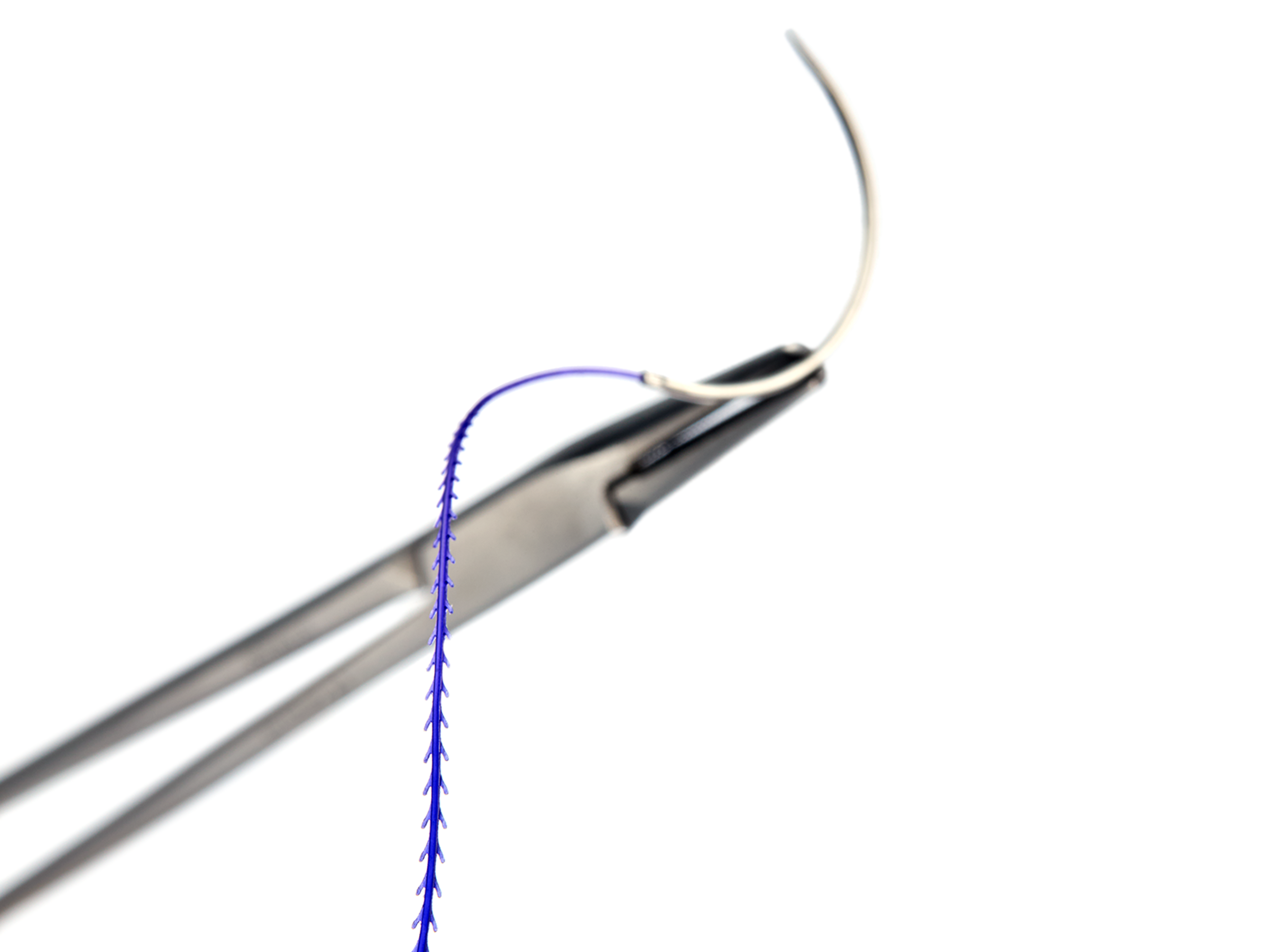 Stratafix being held by a tool with a needle