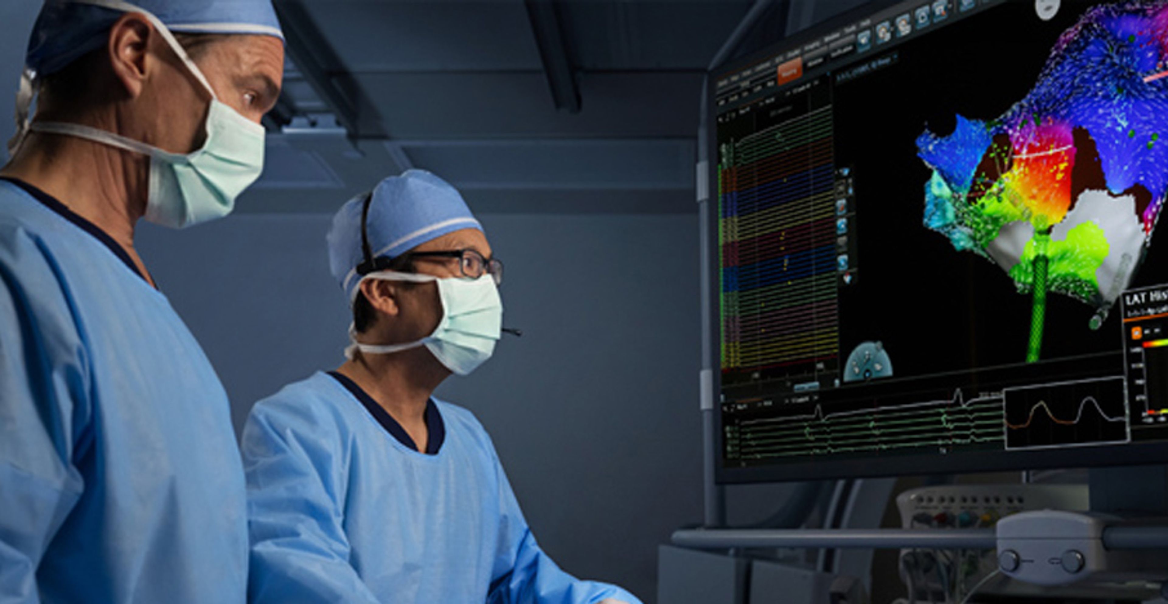 Two physicians looking at a CARTO™ map.
