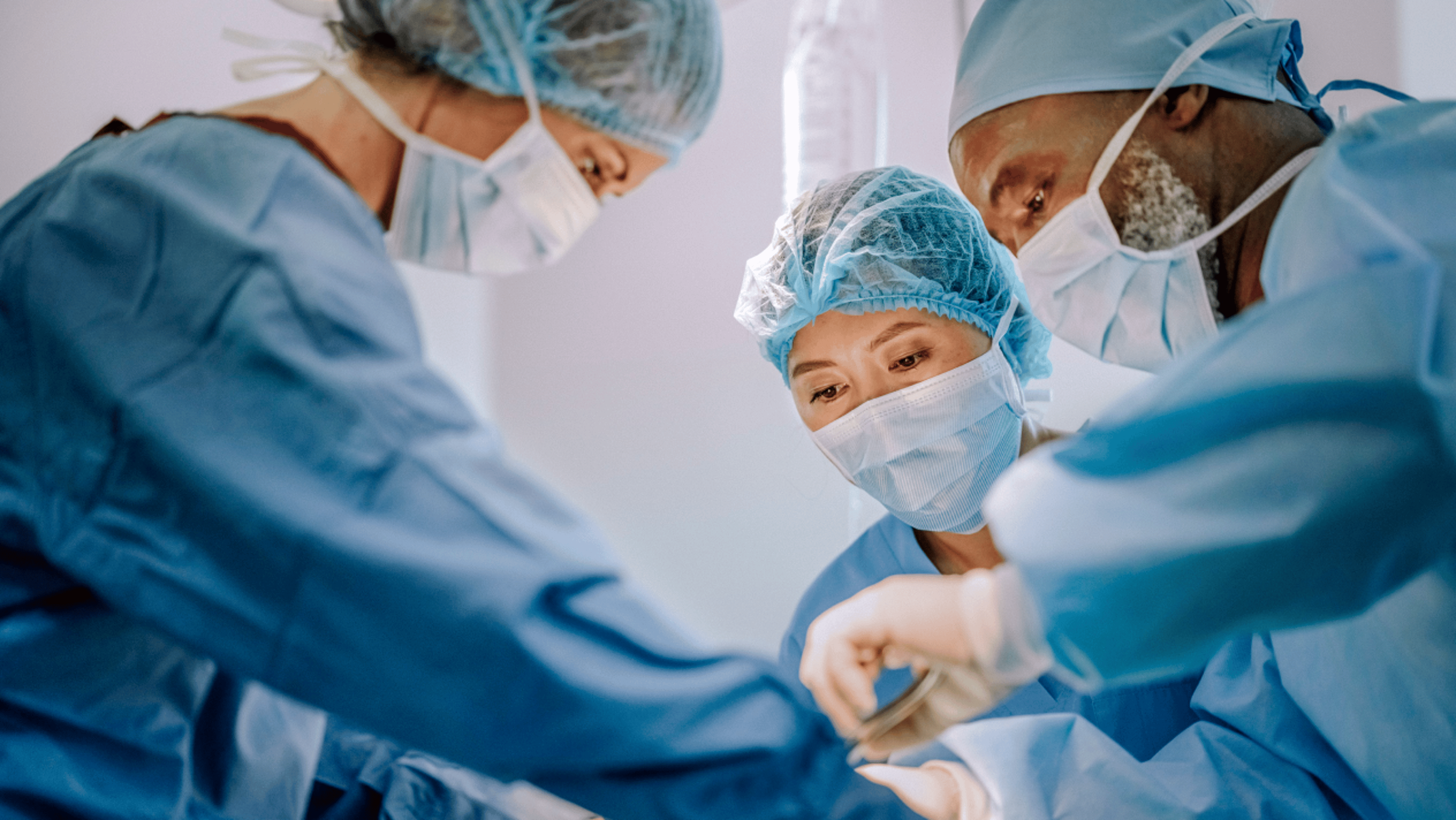 Surgeons operating