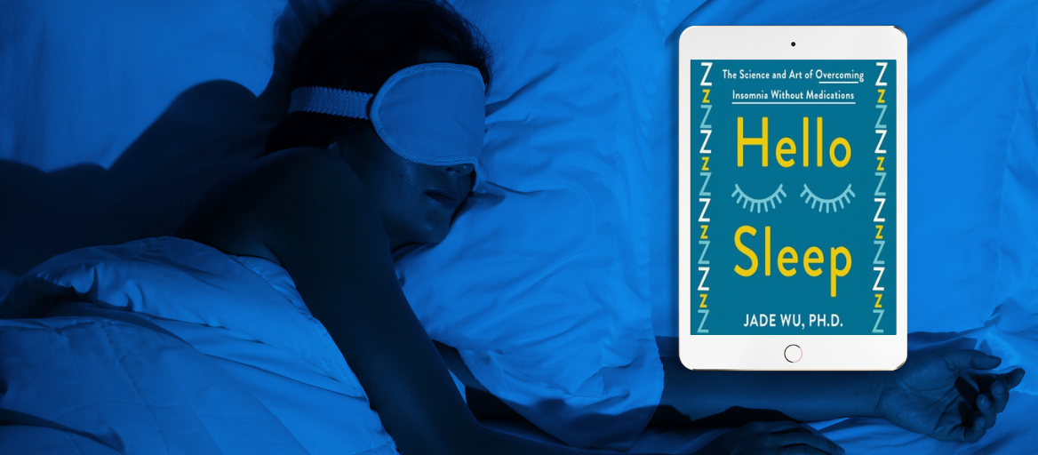 A person sleeps in bed while wearing a sleep mask. A tablet featured the ebook, "Hello Sleep."
