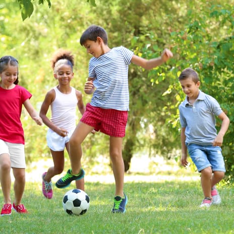 Kids playing football in a language camp in Czechia