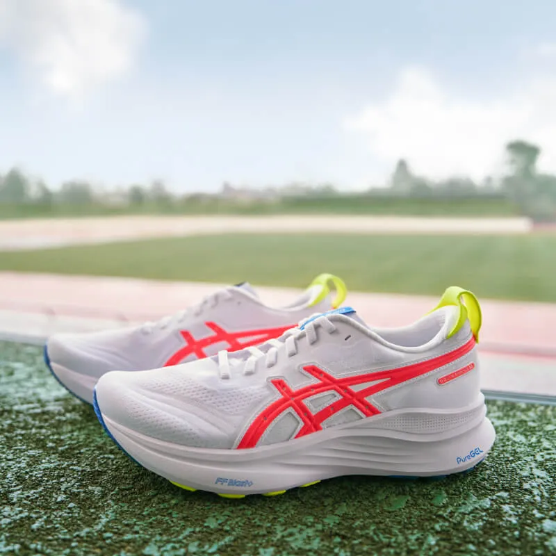 Close up on GEL-KAYANO 32 sneakes with orange stripe