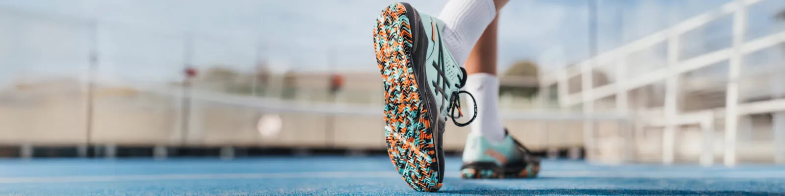 Close up of the limited edition GEL-CHALLENGER shoe from ASICS with a multicolored sole.