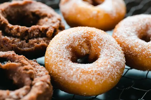 Fresh donut topped with sugar