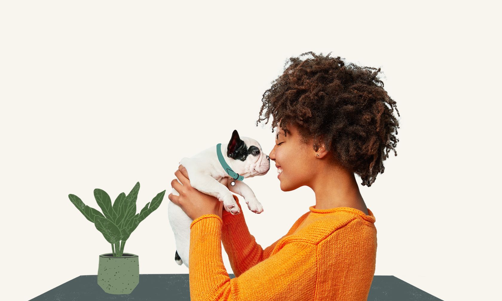 A woman holding a small white and black cat.