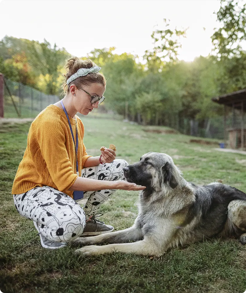 Woman sitting with dog