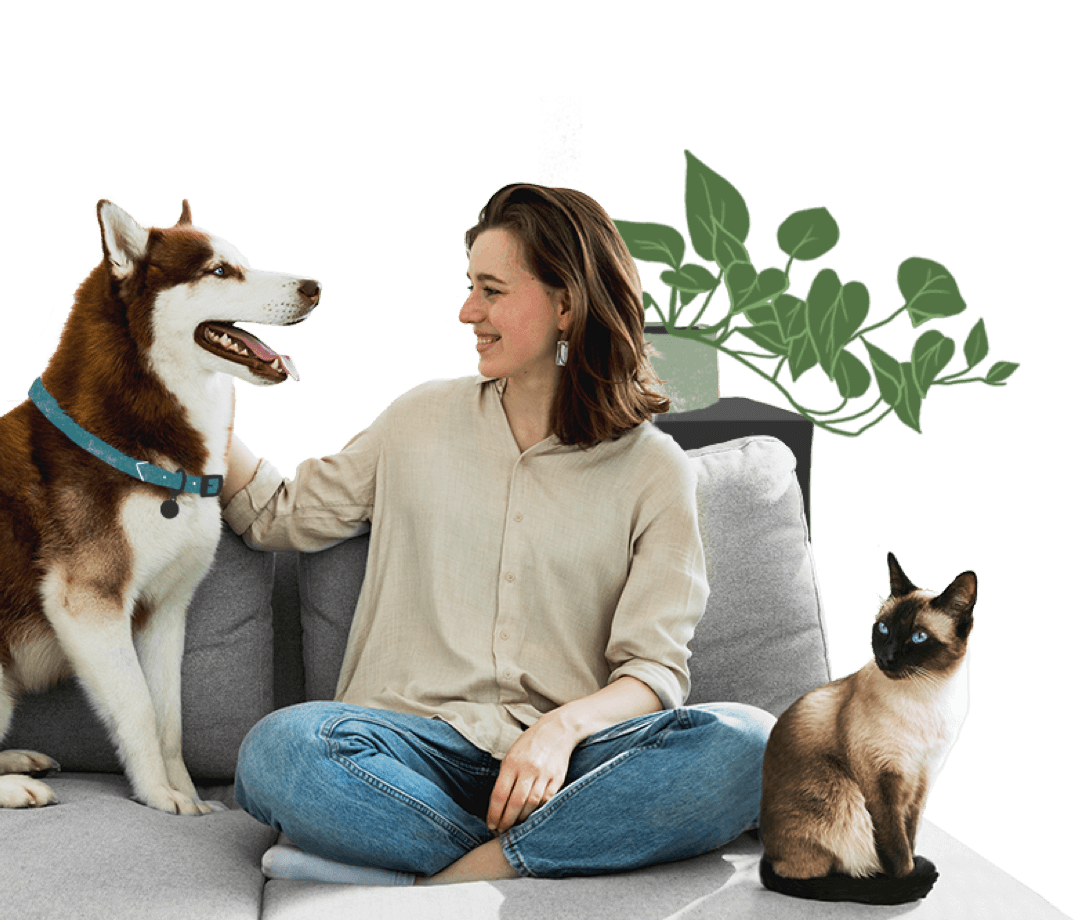 Woman with pets on couch
