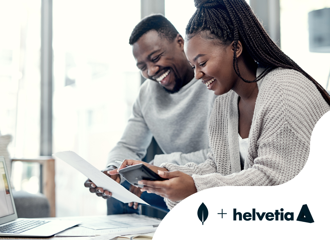 Photo of a man and woman looking at a tablet screen.