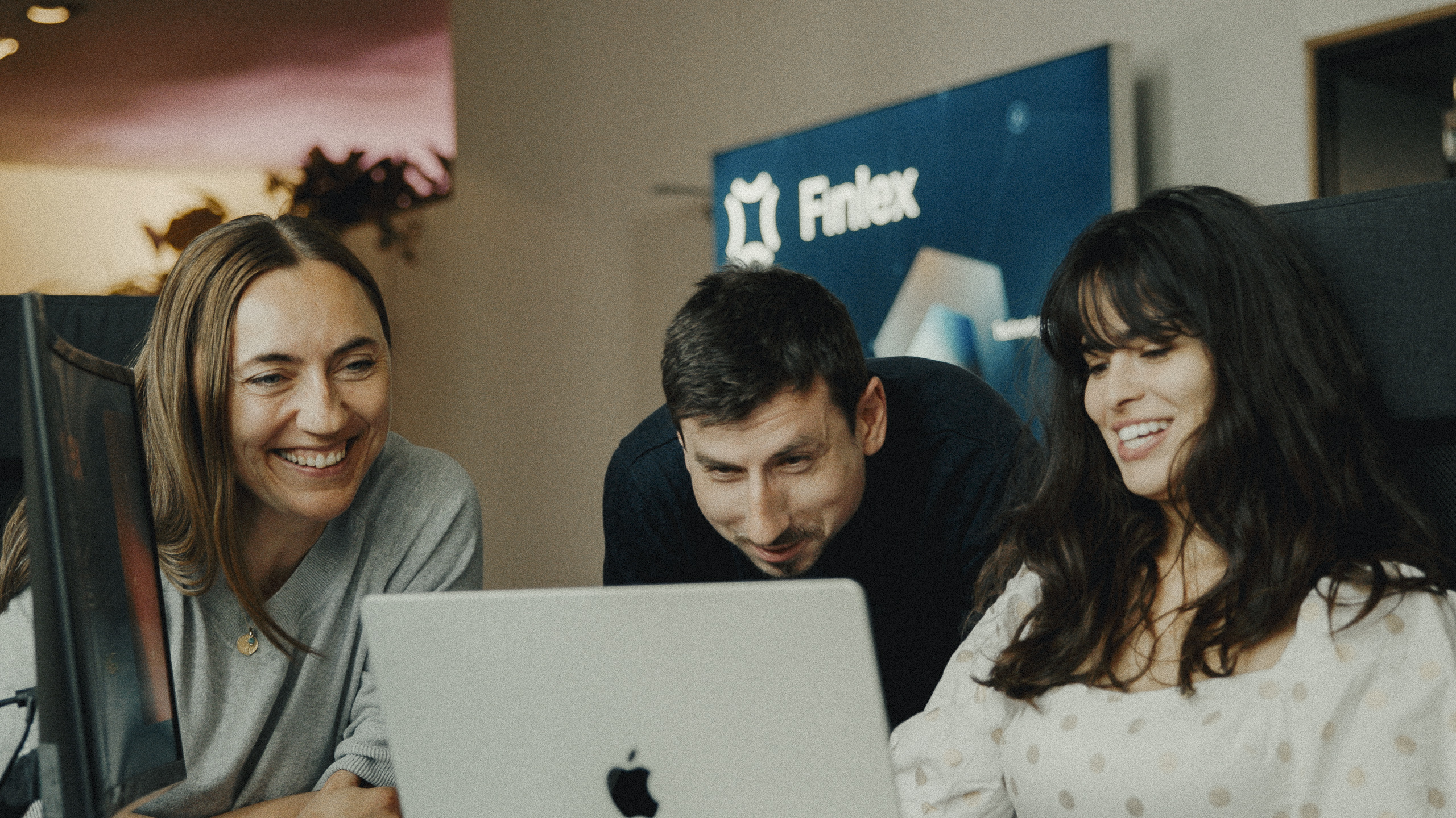 Image of people working in finlex office