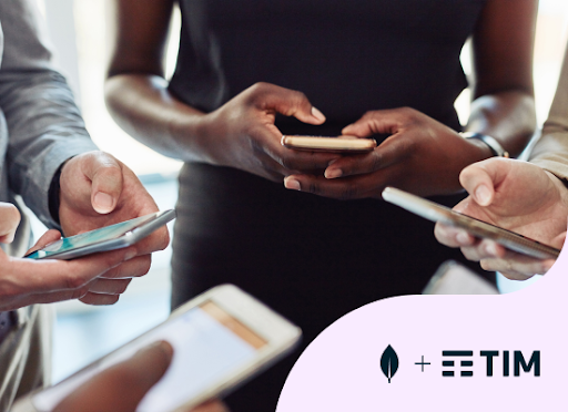 A group of people focused on their smartphones.