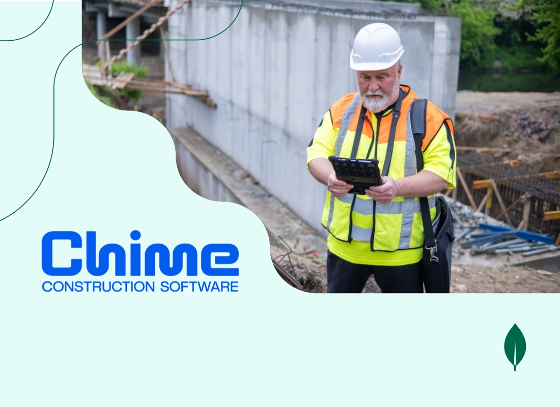 A photo of a construction worker with a tablet.
