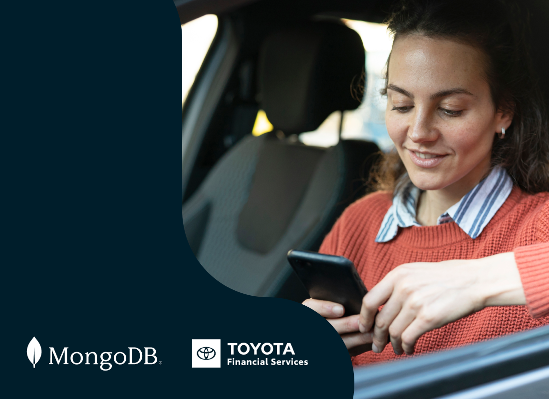 A woman inside a car, using her phone.
