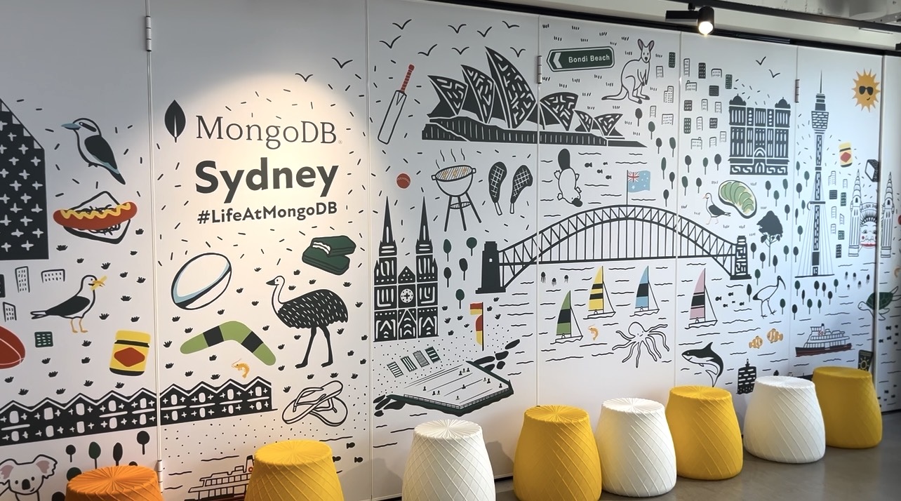 An image of the mural painted in the Sydney, Australia office. It says "MongoDB Sydney" and "#LifeAtMongoDB" along with illustrations representing Sydney.