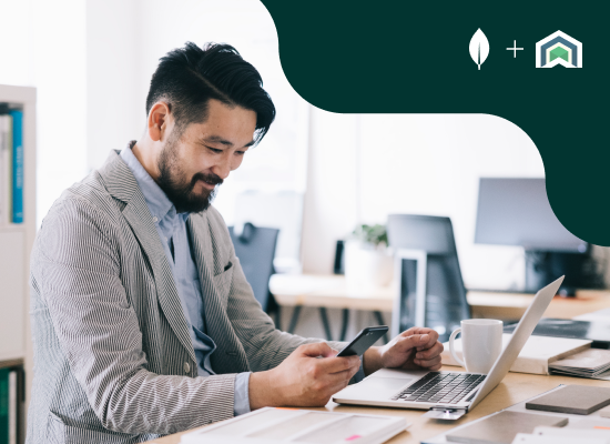 Image of a man working with smart devices.