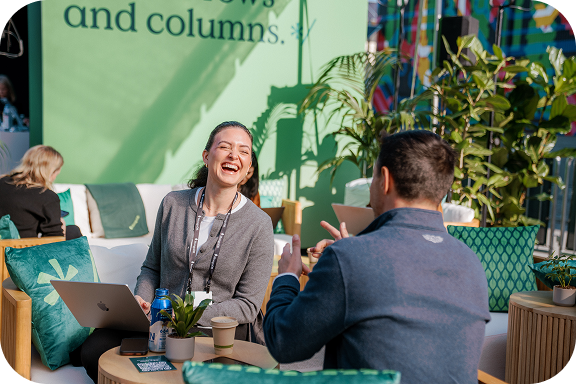 A photo of smiling people at the event