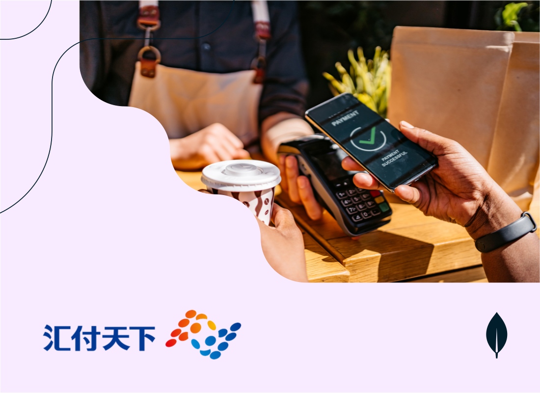 Person making a payment on a mobile phone using a card reader machine.