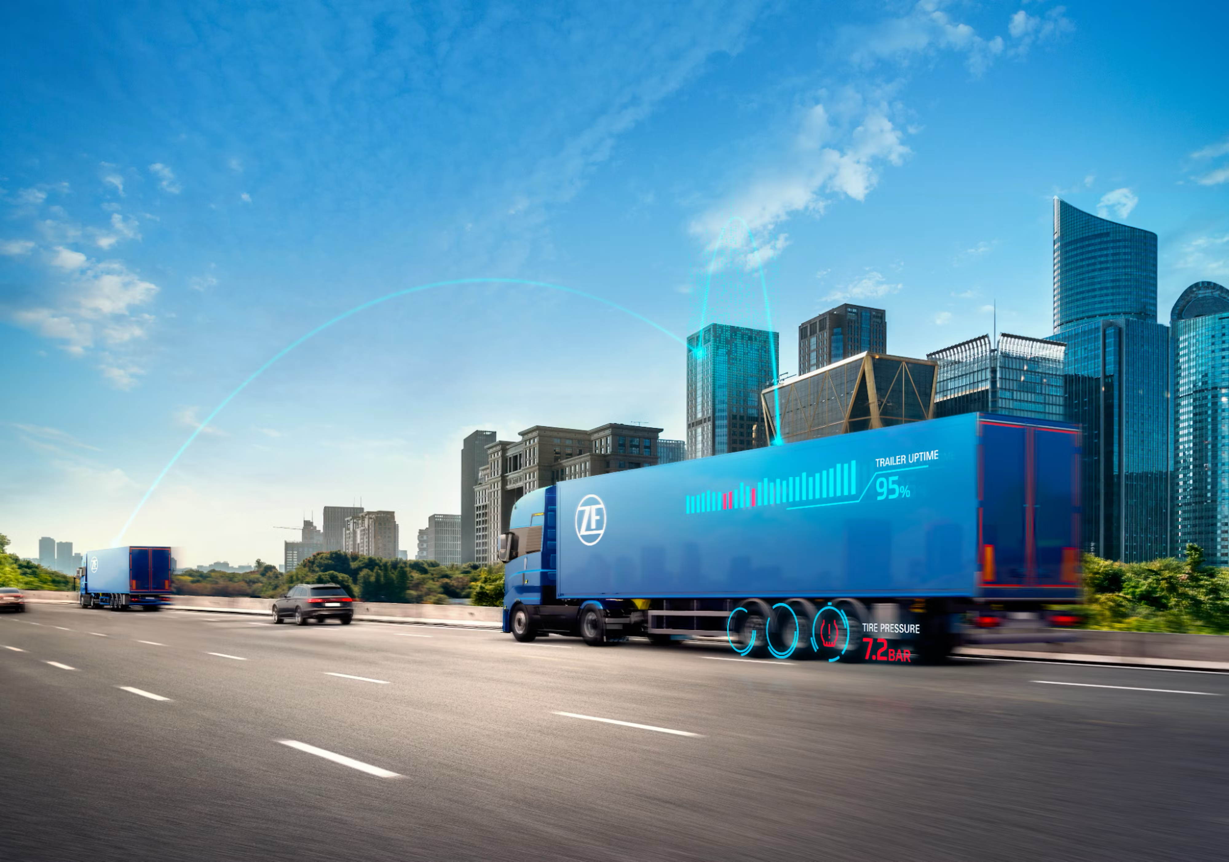 Image of a ZF truck driving on highway near a metropolis