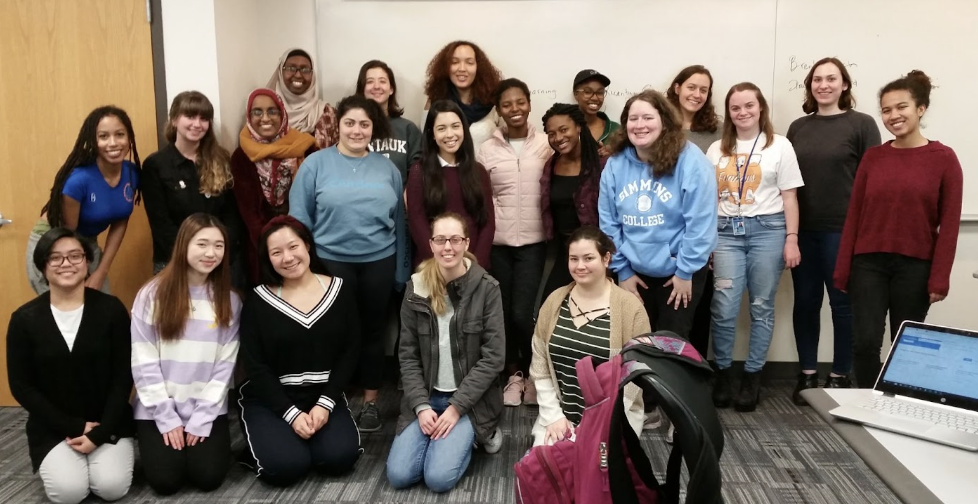 Another photo of some of professor Menzin's students at Simmons University. 