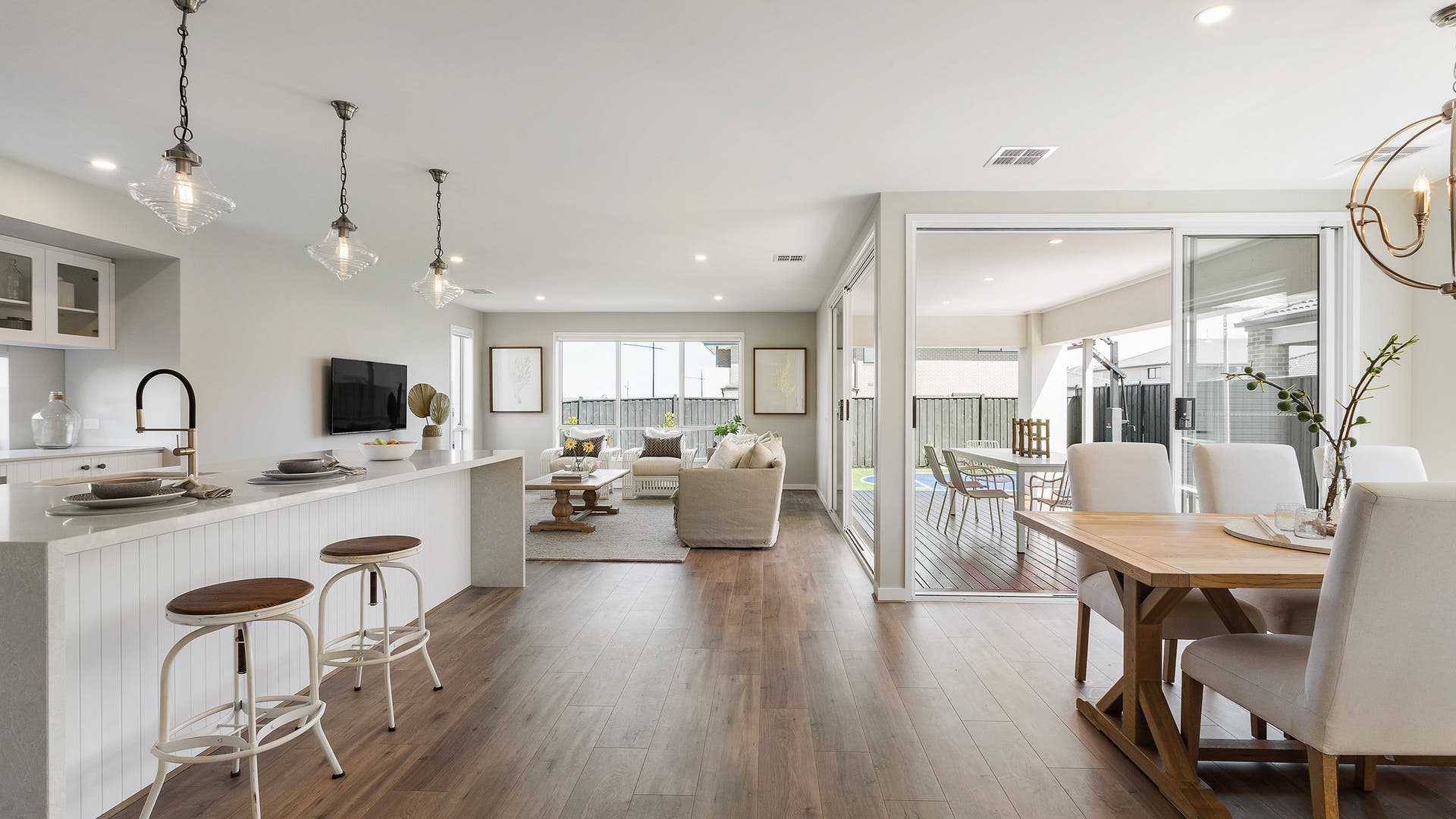 Vogue 34 kitchen, dining, living and alfresco area with vinyl flooring throughout