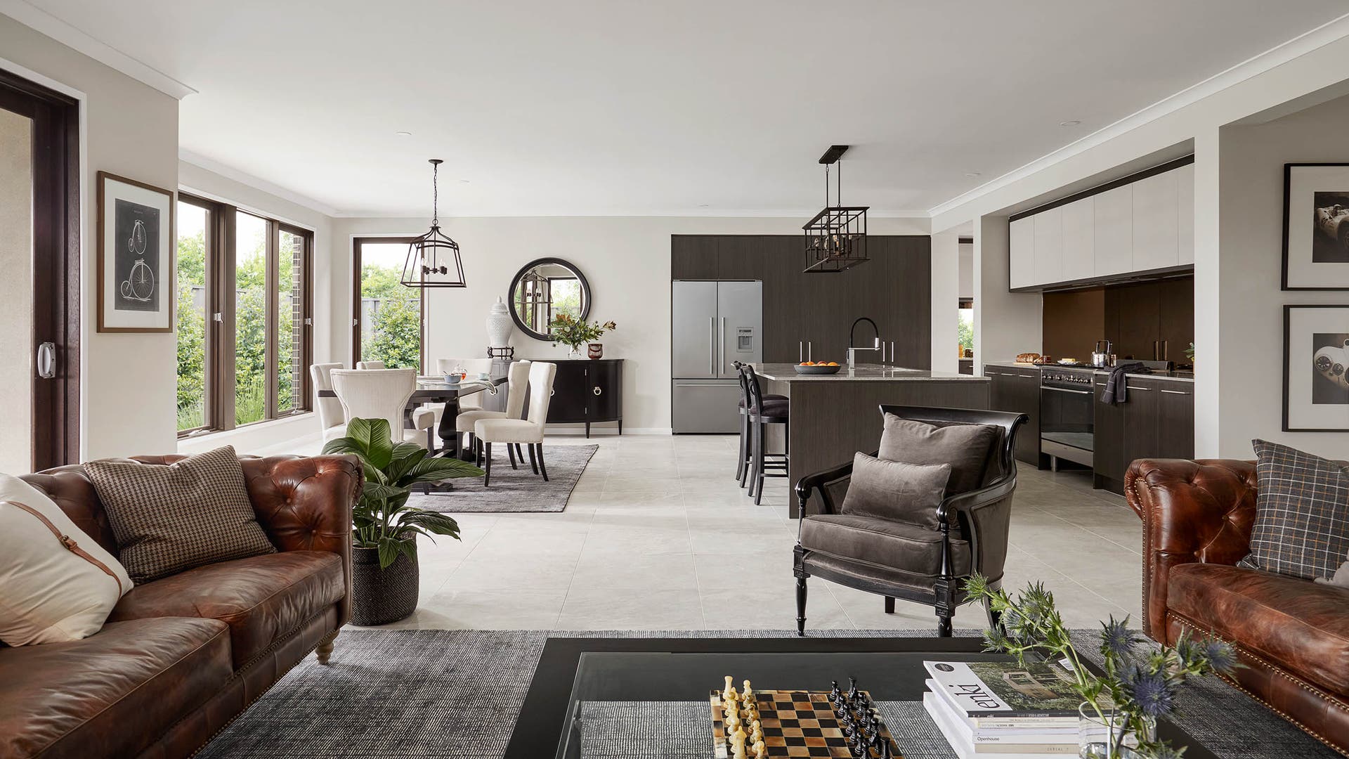 Emperor 48 open plan living zone featuring a dark and moody masculine colour scheme.