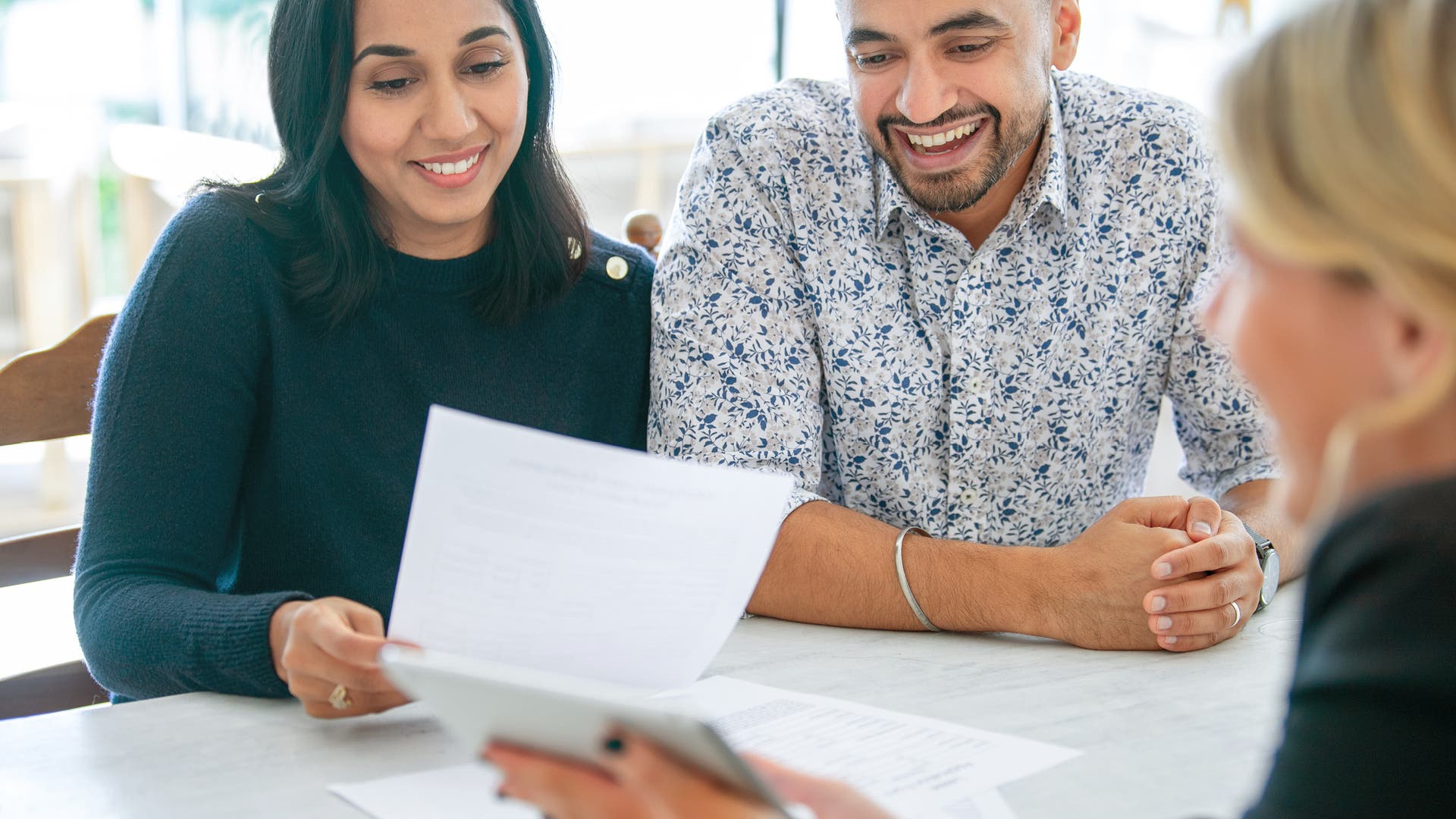 Couple speaking to a mortgage broker