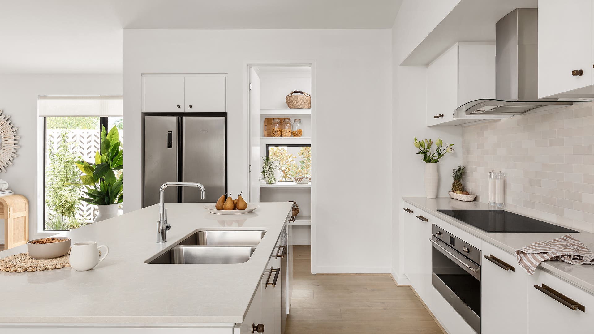 Monaco 26 Kitchen on display at Sunbury with grand island benchtop