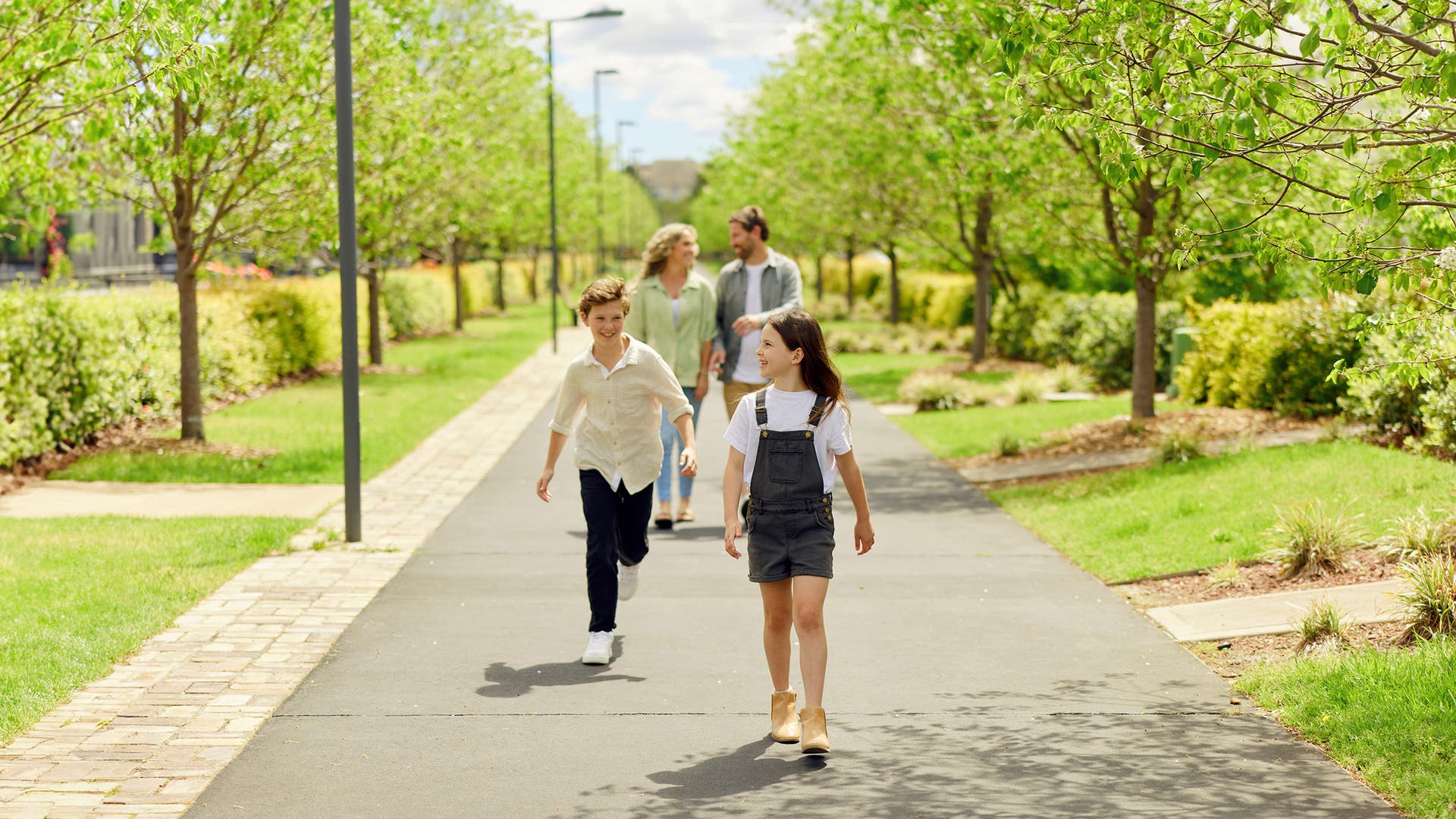 Family walking in cathering park estate