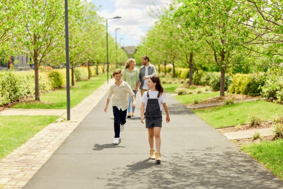 Family walking in cathering park estate