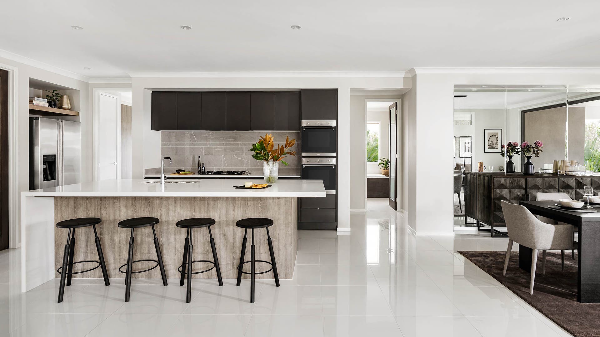 Modern kitchen and laundry in the Lexington single storey home design by Plantation Homes