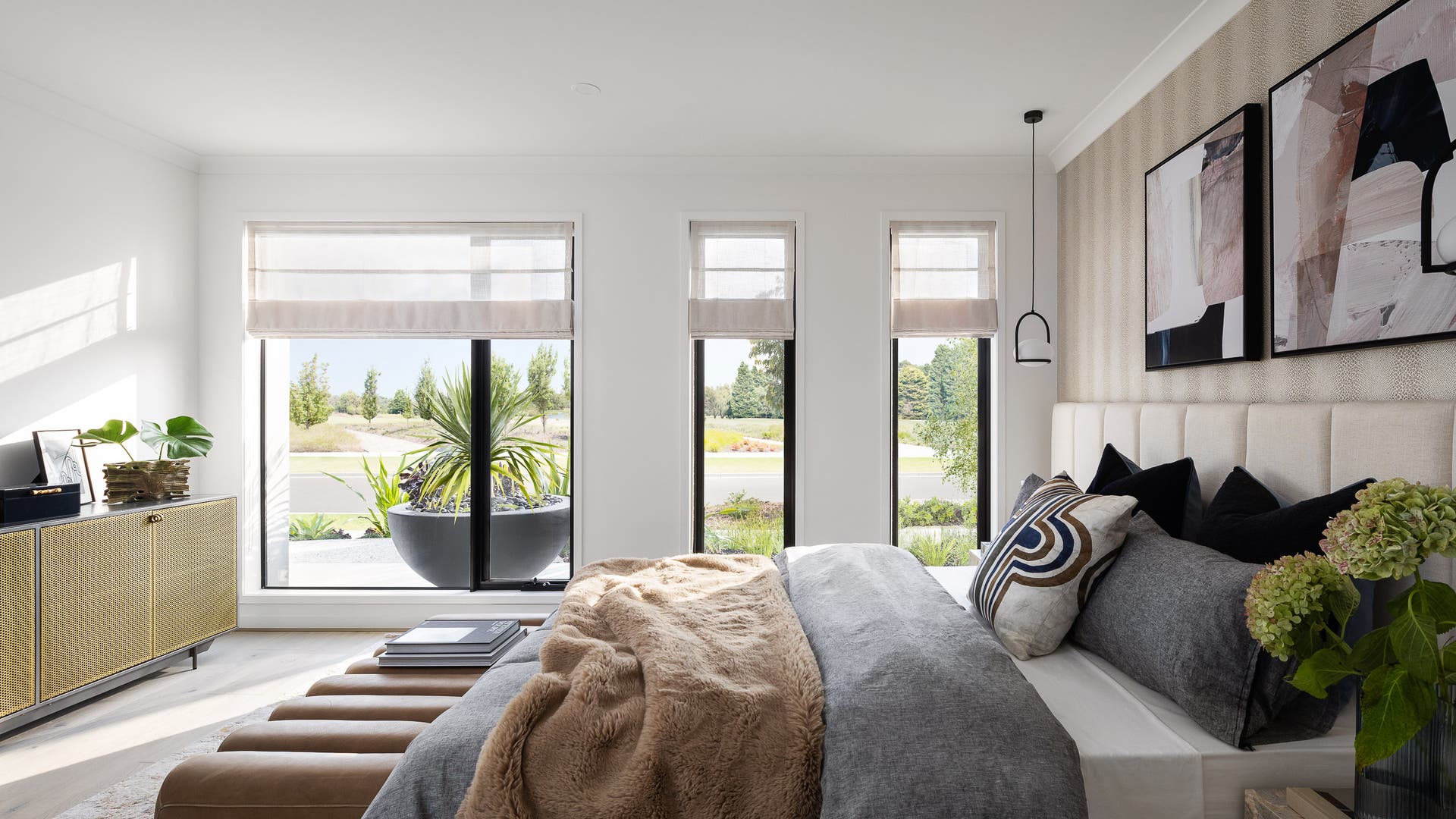 Eliana 232-S25 on display in Clyde North - earthy styled master bedroom
