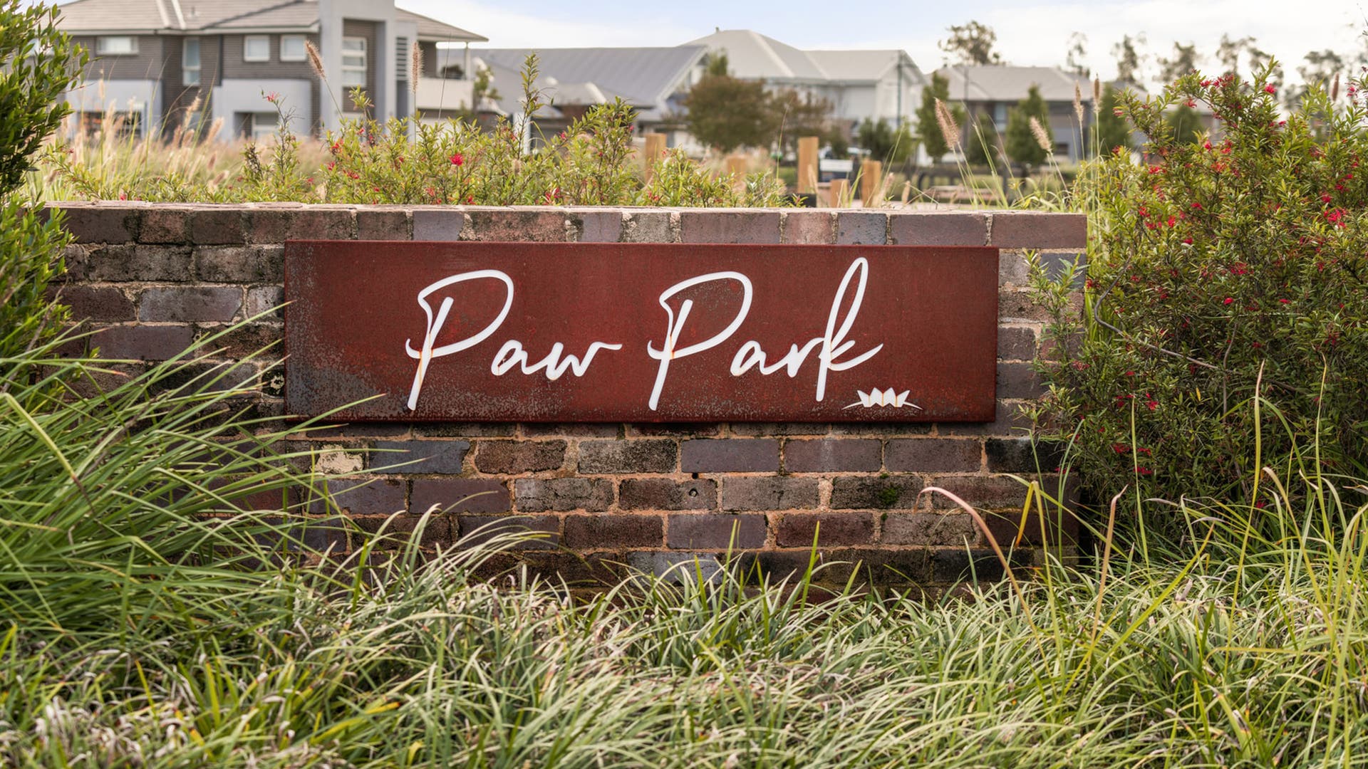 A sign for a dedicated dog park