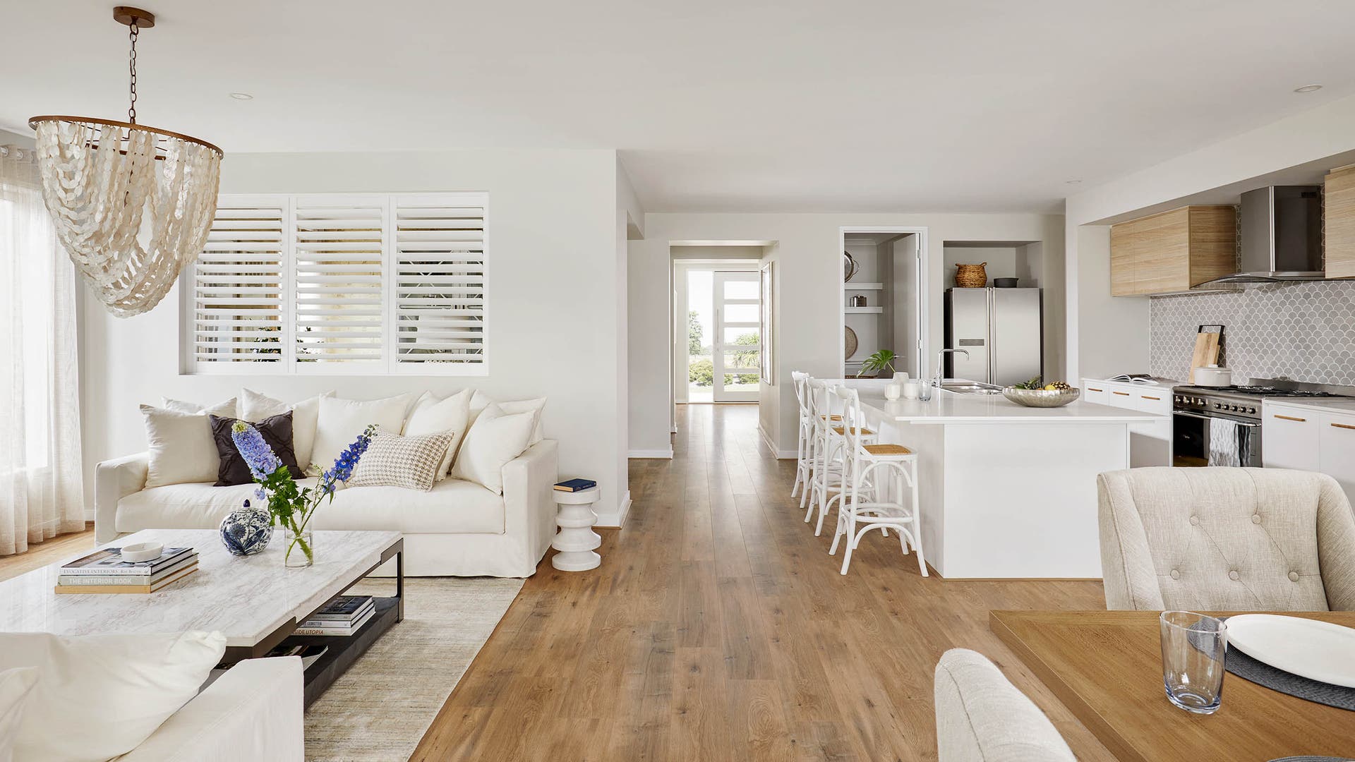 Lexington 28 living, kitchen and dining area with laminate flooring throughout