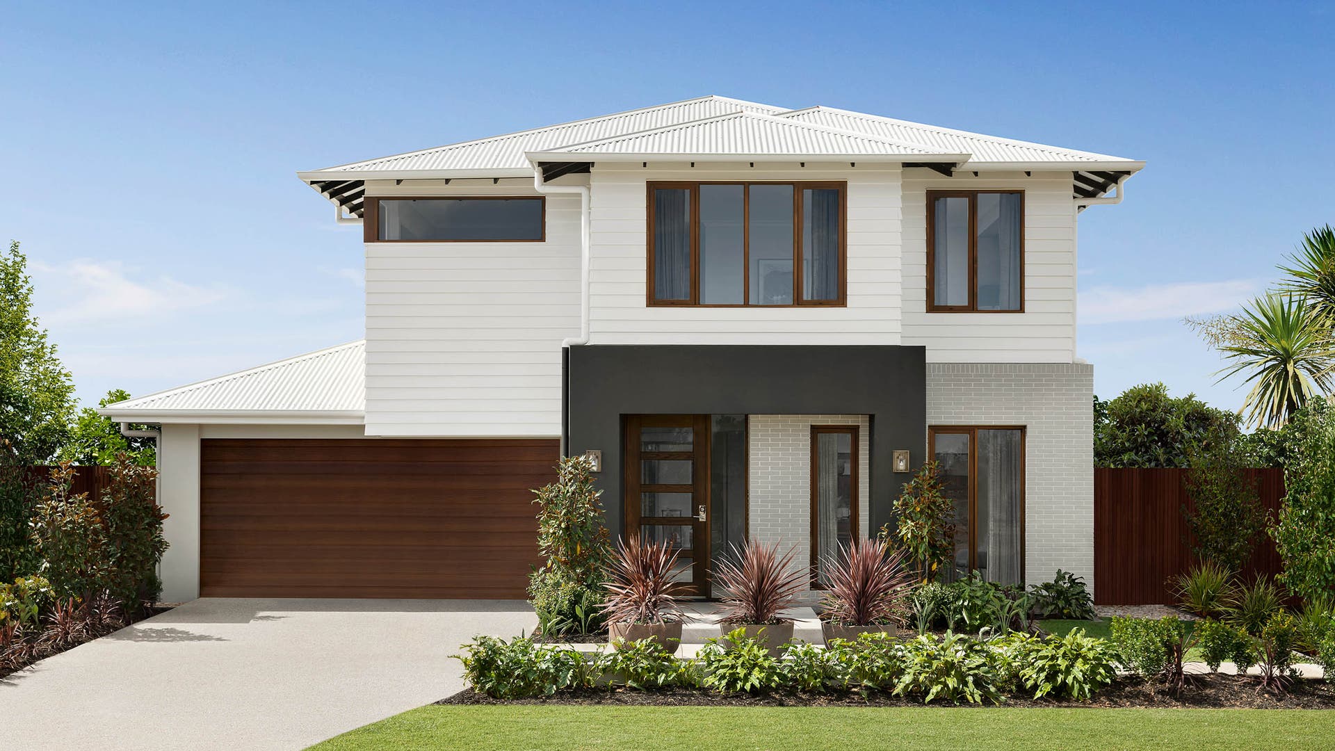 Double storey home design with white brown and grey coloured facade.