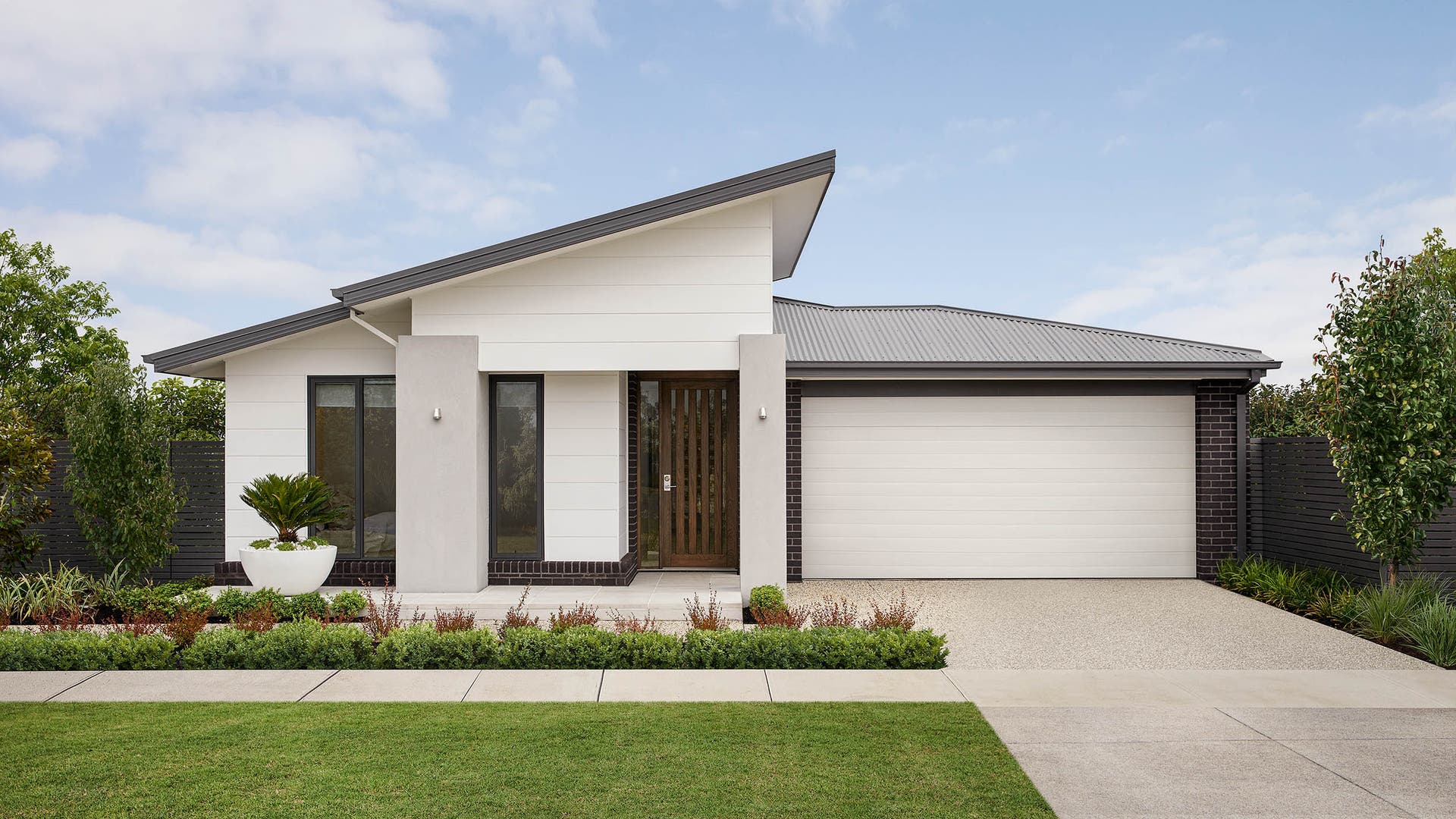 Summit 28 featuring the Botanic facade. The facade features a horizontal Stria Cladding and striking skillion roof.