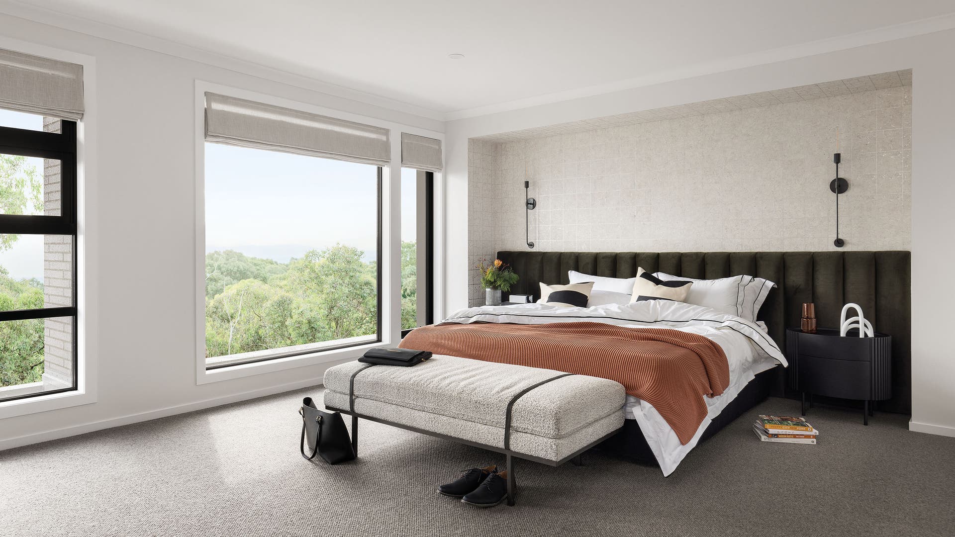 Master bedroom featuring pops of greys, greens and browns