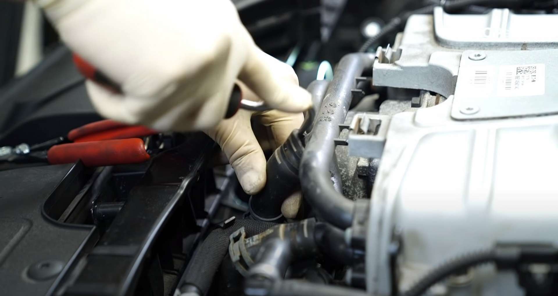 DIY Audi 3.0T Supercharger Oil Change removing the supercharger coolant hoses