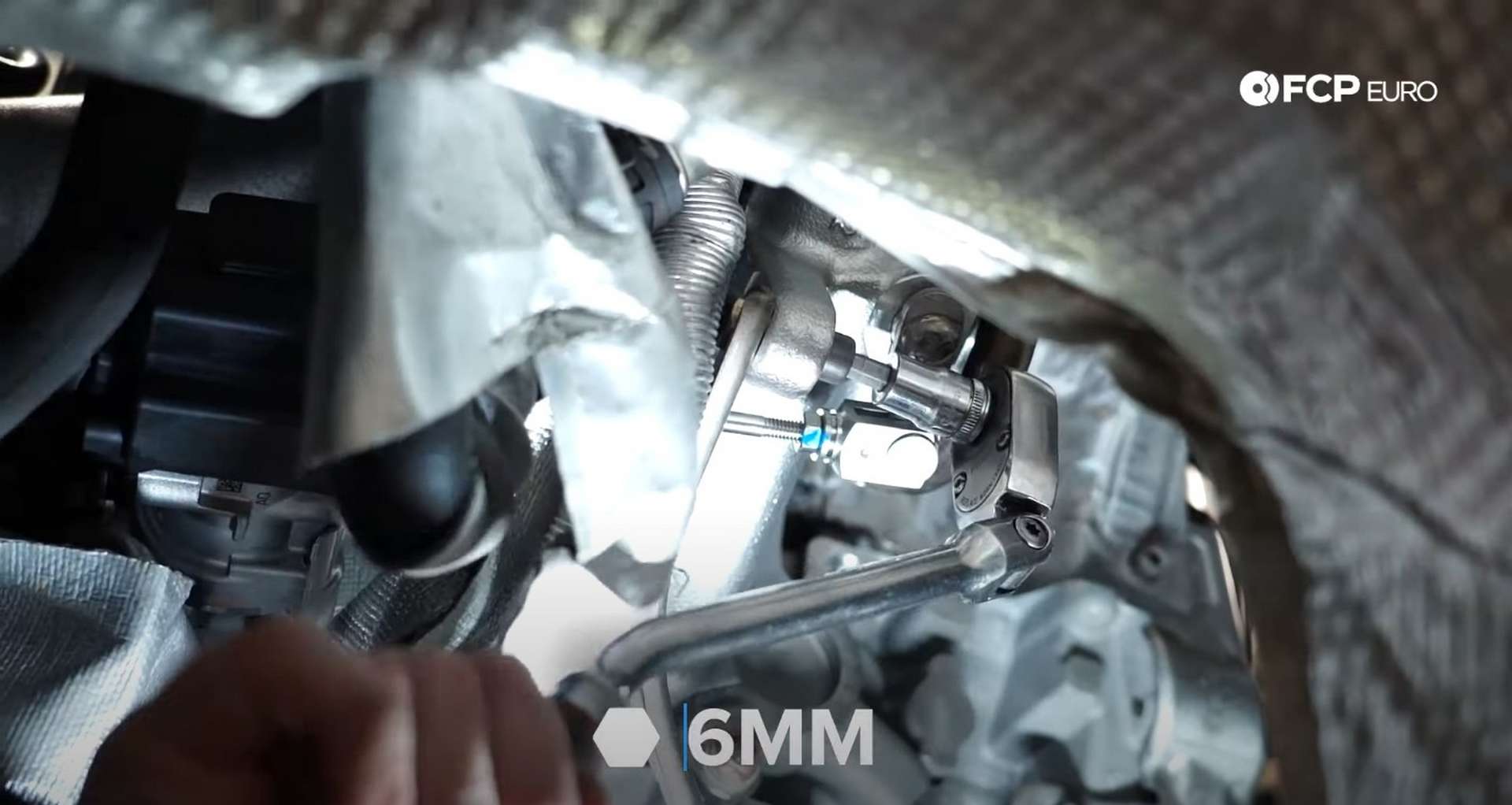 DIY MK7 VW GTI Turbocharger Upgrade installing the turbo support bracket