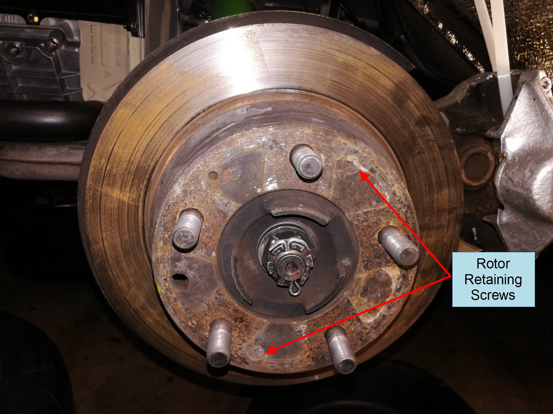 Air-cooled Porsche 911 rear brake rotor removal.