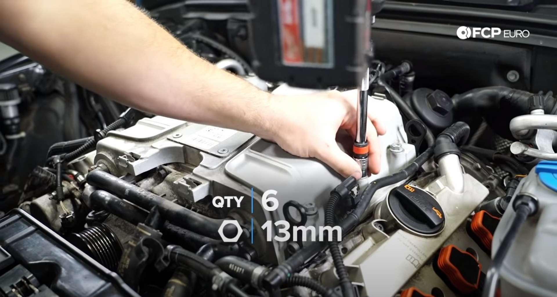 DIY Audi 3.0T Supercharger Oil Change tightening the supercharger nuts