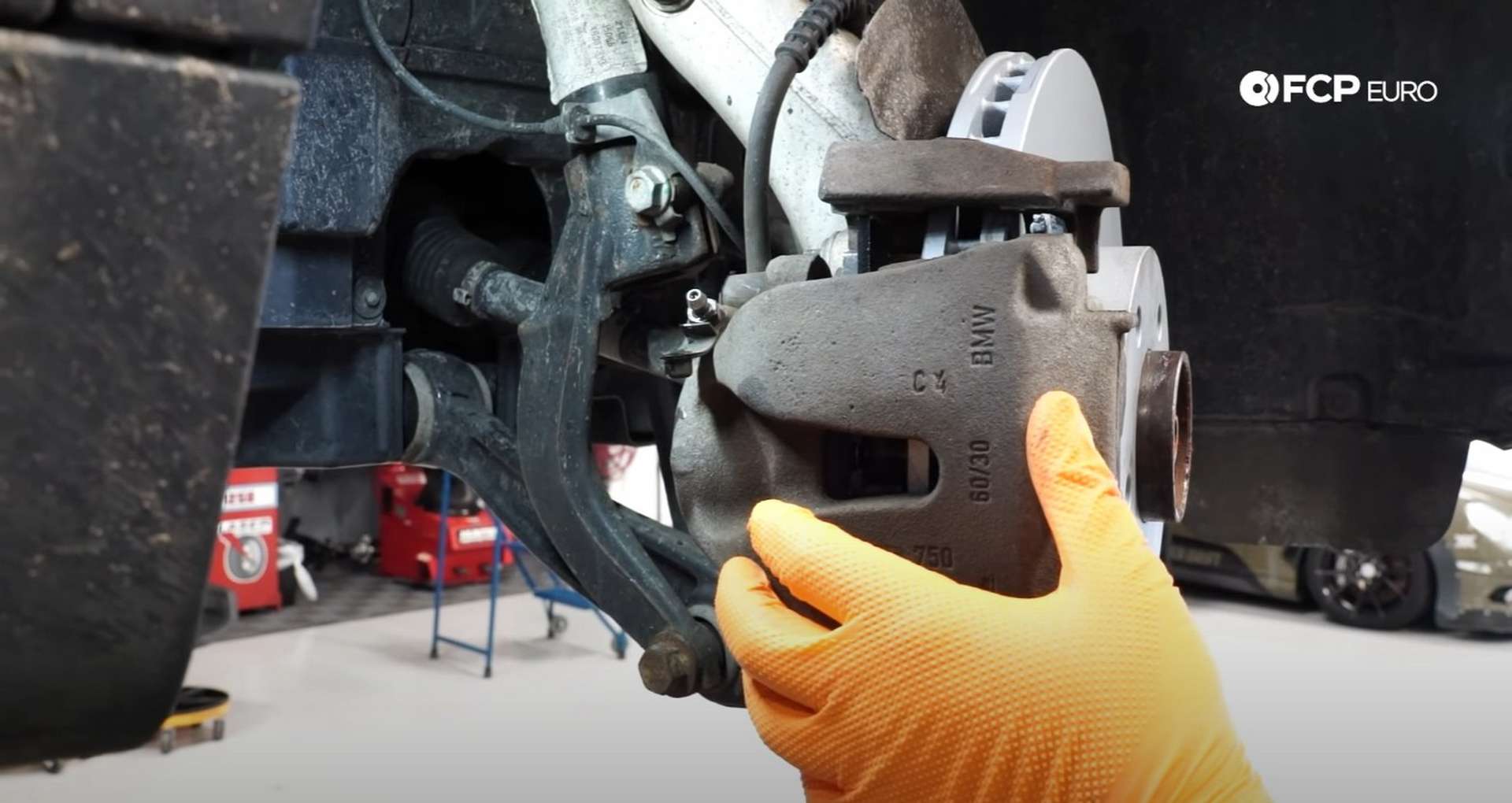 DIY BMW F15 X5 F16 X6 Brake Service reinstalling the caliper]