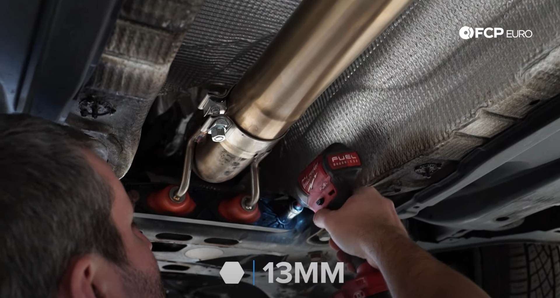 DIY MK7 VW GTI Turbocharger Upgrade tightening the lower bracket bolts