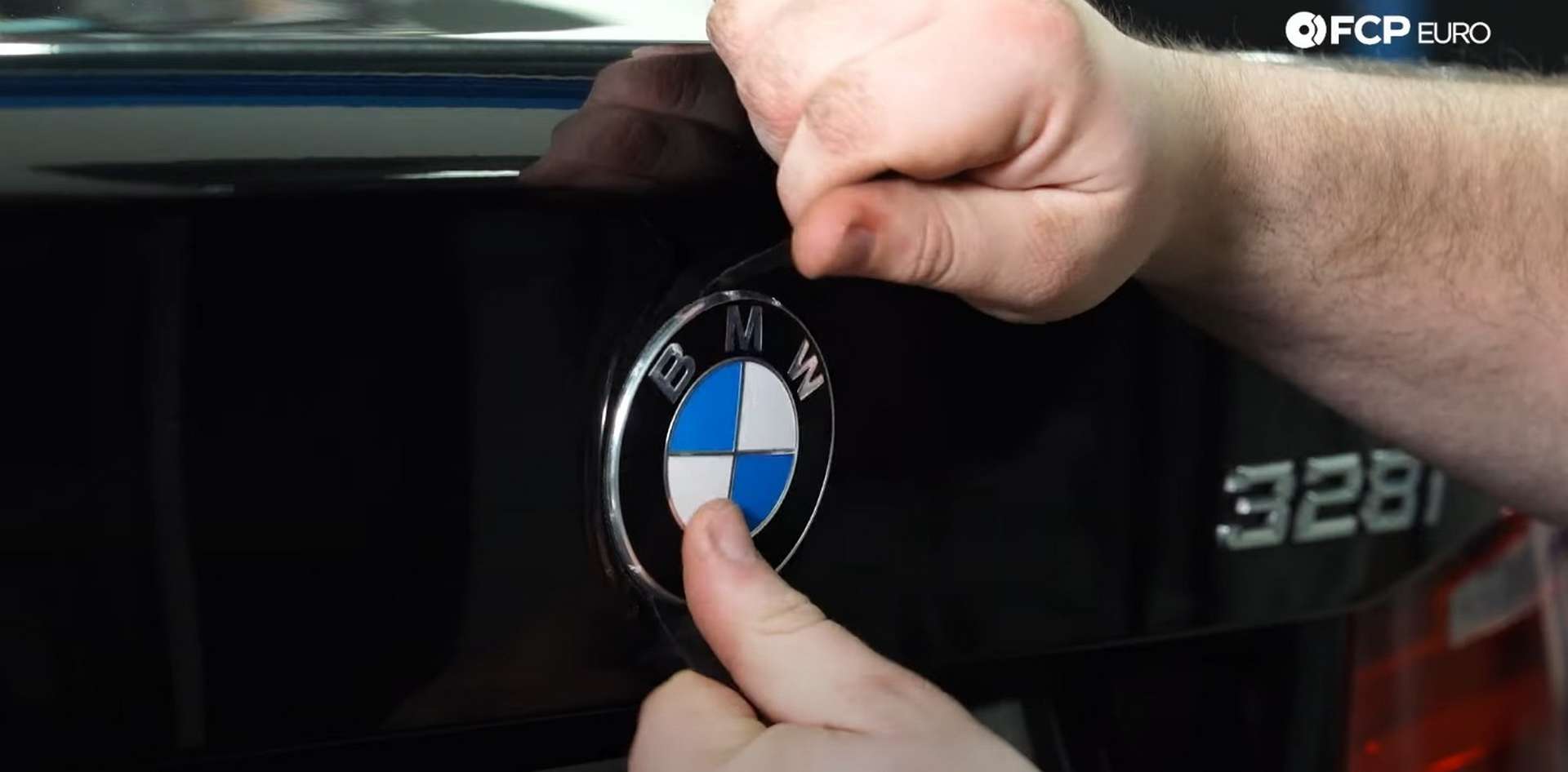 DIY BMW F30 Roundel Replacement pulling off the trunk badge