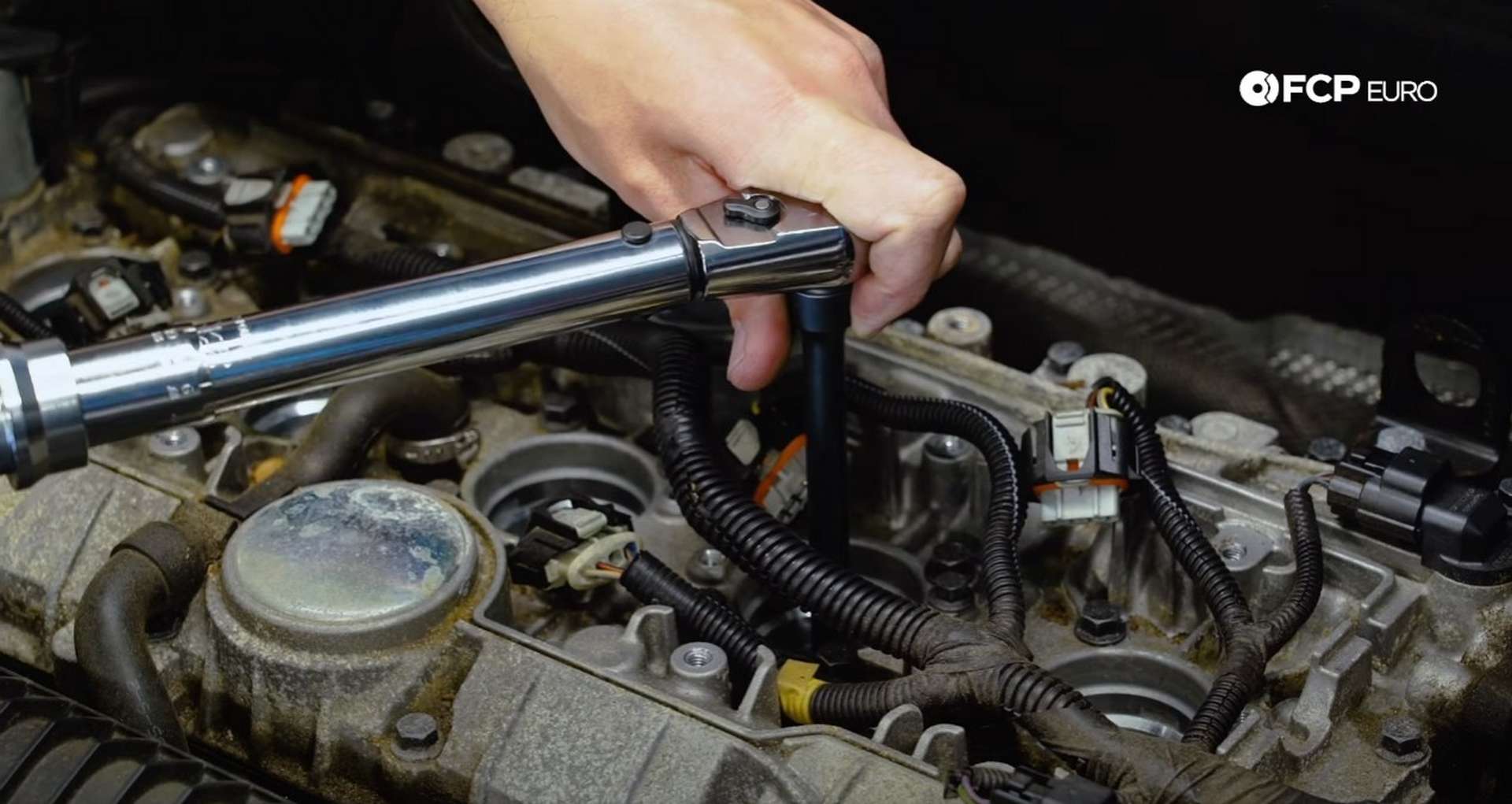DIY Volvo Spark Plug and Ignition Coil Replacement torquing the new spark plugs