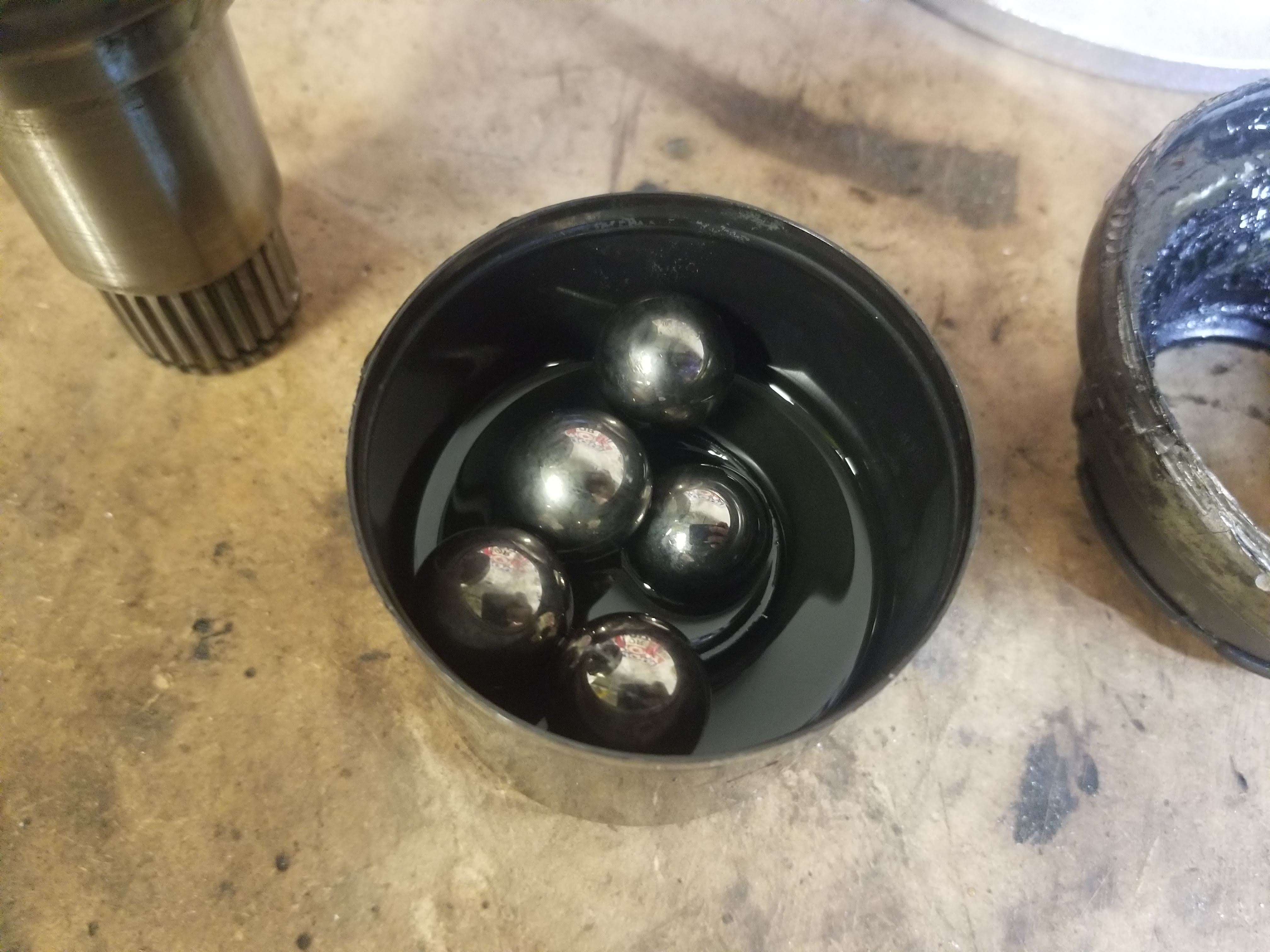 How To Disassemble, Clean, And Rebuild The Inner CV Axle Boot On A W204