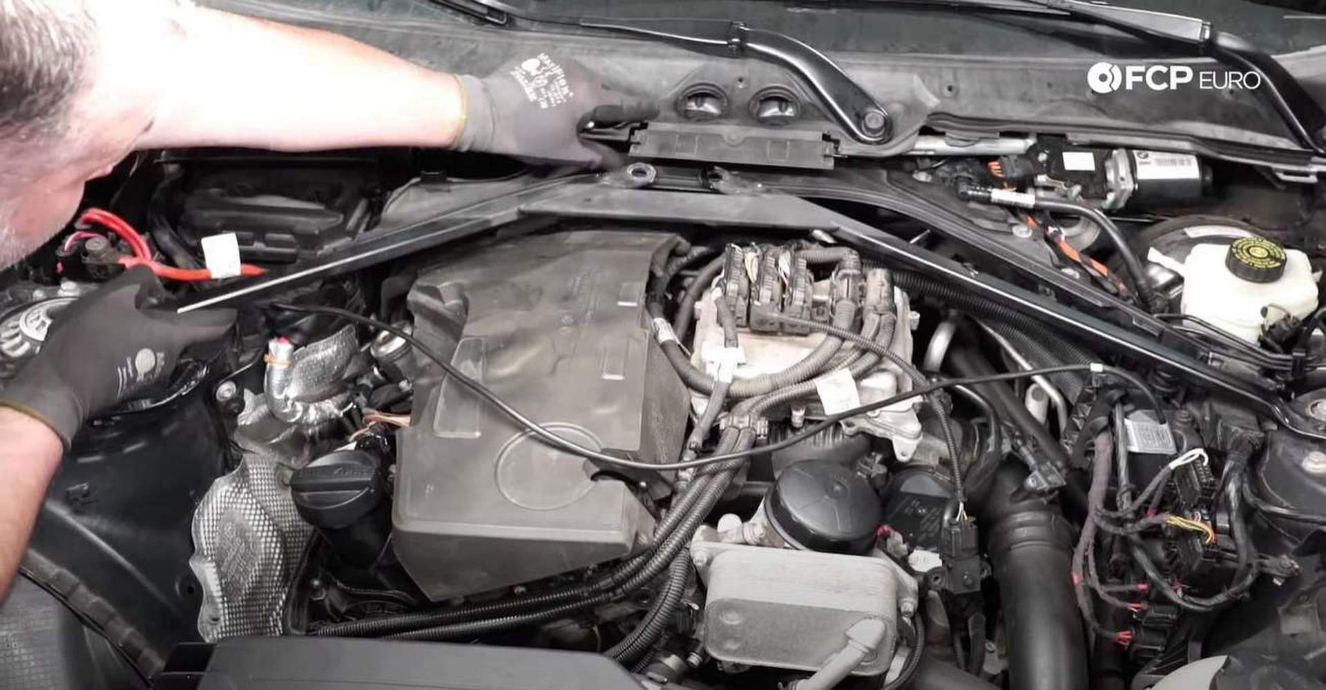 DIY BMW F30 Fuel Injector Replacement refitting the strut tower brace