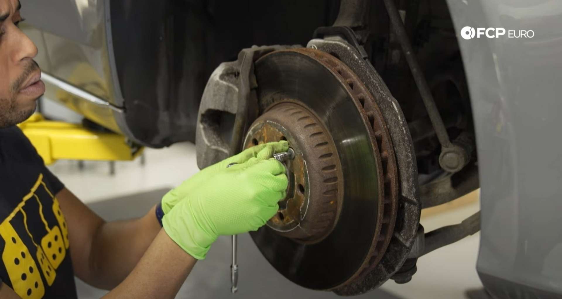 DIY Mercedes-Benz W205 Front Brake Service removing the set screw