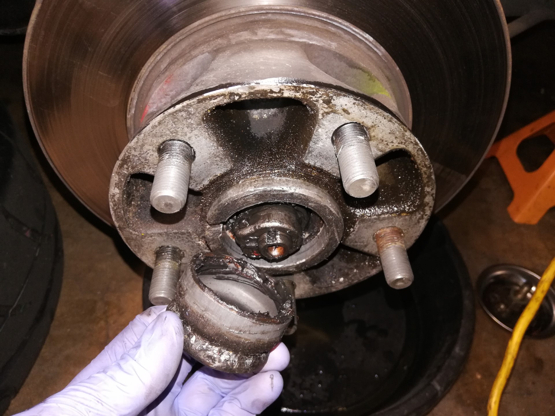 Air-cooled Porsche 911 front wheel hub dust cap removal