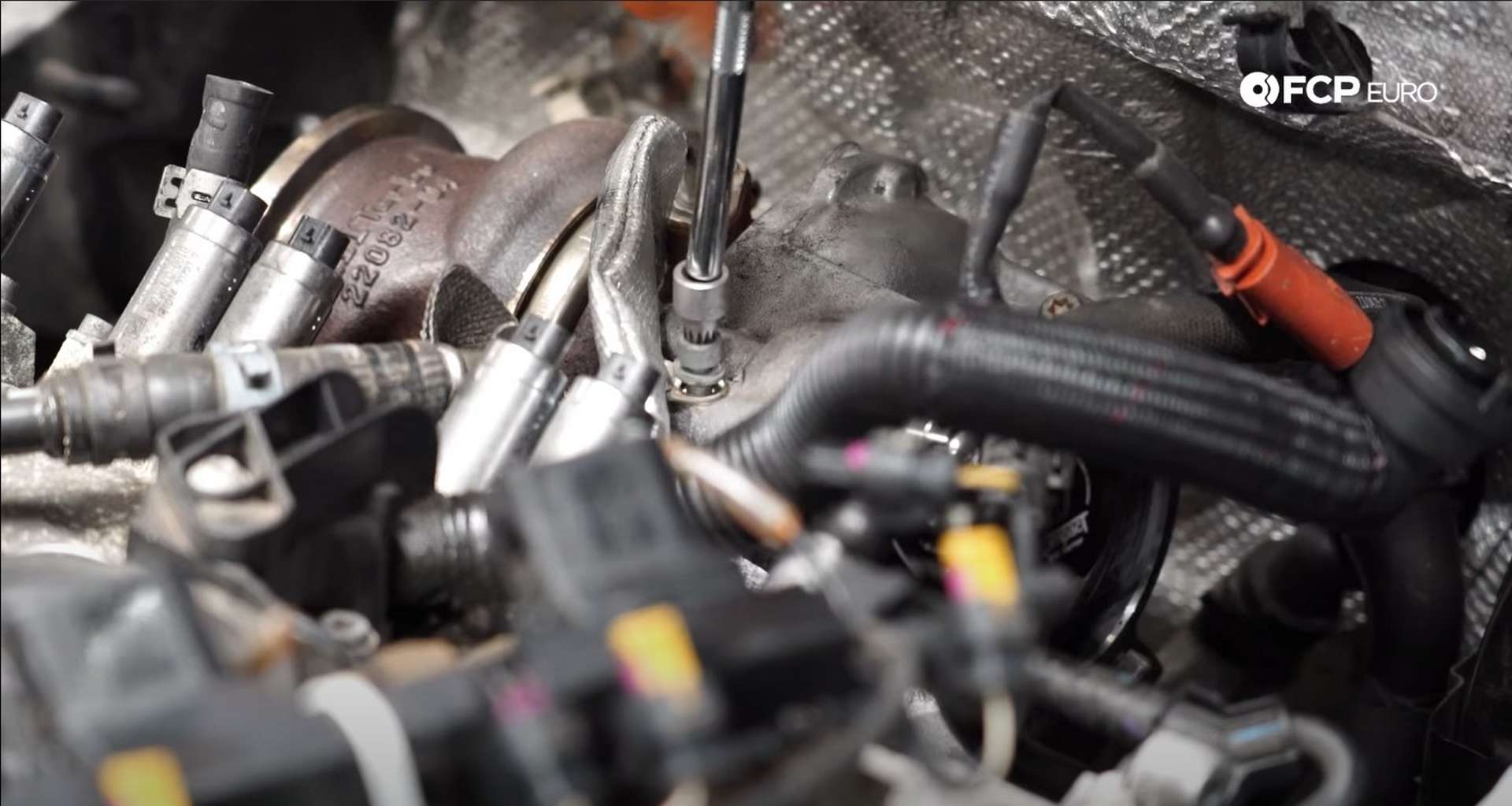 DIY MK7 VW GTI Turbocharger Upgrade removing oil feed line bracket bolt
