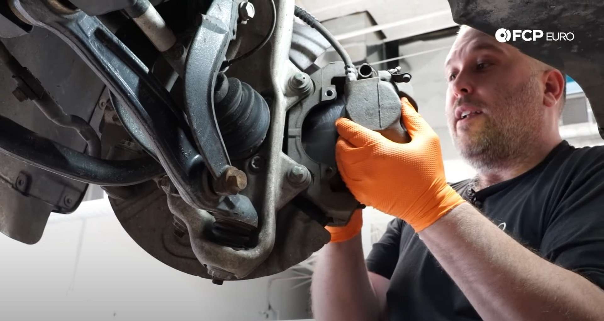DIY BMW F15 X5 F16 X6 Brake Service removing the caliper